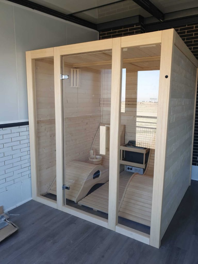 Sauna Olmo con tumbona Sauna interior Saunakris